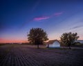 Sunet field and old small house Royalty Free Stock Photo