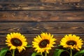 Sunflower frame on wooden background top view copyspace