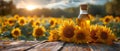 Sunflower oil in a bottle on a background of sunflowers Royalty Free Stock Photo