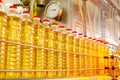 Sunflower oil. Factory line of production and filling of refined oil from sunflower seeds. Factory conveyor of food industry