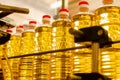 Sunflower oil. Factory line of production and filling of refined oil from sunflower seeds. Factory conveyor of food industr