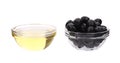 Sunflower oil and olives in glass bowl. Royalty Free Stock Photo