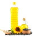 Sunflower oil in plastic bottle, seeds and flower isolated on white background Royalty Free Stock Photo