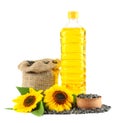 Sunflower oil in plastic bottle, seeds and flower isolated on white background Royalty Free Stock Photo