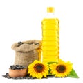 Sunflower oil in plastic bottle, seeds and flower isolated on white background Royalty Free Stock Photo