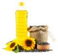 Sunflower oil in plastic bottle, seeds and flower isolated on white background Royalty Free Stock Photo