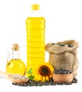 Sunflower oil in plastic bottle, seeds and flower isolated on white background Royalty Free Stock Photo
