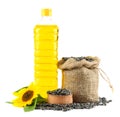 Sunflower oil in plastic bottle, seeds and flower isolated on white background Royalty Free Stock Photo