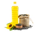 Sunflower oil in plastic bottle, seeds and flower isolated on white background Royalty Free Stock Photo