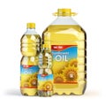 Sunflower oil in plastic bottles on white.