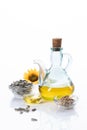 Sunflower oil and sunflower seeds isolated on white background with copyspace. Vertical format Royalty Free Stock Photo