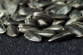 Sunflower seeds on a dark fabric background Royalty Free Stock Photo