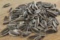 Sunflower seeds on wooden background Royalty Free Stock Photo