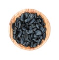 Sunflower seeds in a wooden bowl Royalty Free Stock Photo