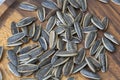 Sunflower seeds on wooden surface - healthy snack Royalty Free Stock Photo