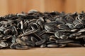 Sunflower seeds on wooden surface Royalty Free Stock Photo