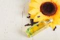 Sunflower and a small bottle of oil