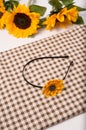 Sunflowers and accessory with needling Royalty Free Stock Photo