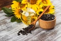 Sunflowers, bottle with oil and sunflower seeds