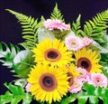 Sunflowers and Gerbera daisies flower arrangement with fern AI-Generated