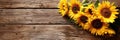 sunflowers on rustic wooden background many wooden slats Royalty Free Stock Photo