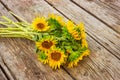 Sunflowers on an rustic wooden table