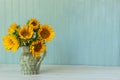 Sunflowers. Summer bouquet in crockery with pastel background Royalty Free Stock Photo