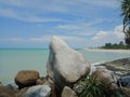 Sungailiat, Bangka, Indonesia. June 2, 2022. Beautiful Batu Ketak beach in Bangka Island. Blue Cloud sky. Granite stone.