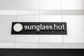 Sunglass Hut retail store sign