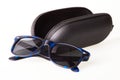Sunglasses with black open protective case isolated