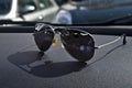 Sunglasses on can dashboar Royalty Free Stock Photo