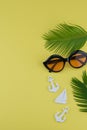 Sunglasses decorate with fern leaves and tiny sailboat and anchor