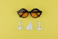 Sunglasses decorate with tiny sailboat and anchor