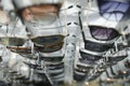 Sunglasses on display shelves in glasses store Royalty Free Stock Photo