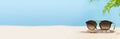 Sunglasses fashion offer banner. Summer sunglass sale-out offer. Sunglasses on a beach sand with tropical leaves. Summer Optics Royalty Free Stock Photo