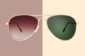 Sunglasses golden metallic frame and green polarized lenses isolated on brown background