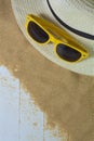 Sunglasses and hat on beach Royalty Free Stock Photo