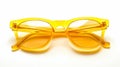 Sunglasses isolated over a white background in yellow Royalty Free Stock Photo