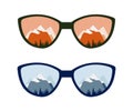 Sunglasses with mirrored mountains and clear sky Royalty Free Stock Photo