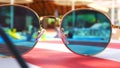 Sunglasses. Pool reflection. Concept of holiday at sea. Observations children, play. TimeLapse.