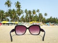 Sunglasses on the sand Royalty Free Stock Photo