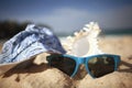 Sunglasses on a sandy beach