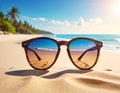 Sunglasses on a sandy beach concept Summer Royalty Free Stock Photo