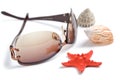 Sunglasses and sea shells isolated