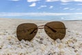 Sunglasses at the Shellbeach in Australia