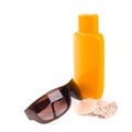 Sunglasses, shells and lotion Royalty Free Stock Photo