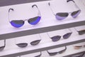 Sunglasses shop with quality shades on top shelf in expensive pr