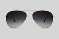 Sunglasses silver metallic frame and gray polarized lenses isolated on gray background Royalty Free Stock Photo