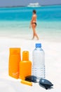 Sunglasses, water and sun protection cream Royalty Free Stock Photo