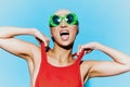 Sunglasses woman cheerful smile fashion mouth portrait trendy hat surprised beauty summer attractive swimsuit